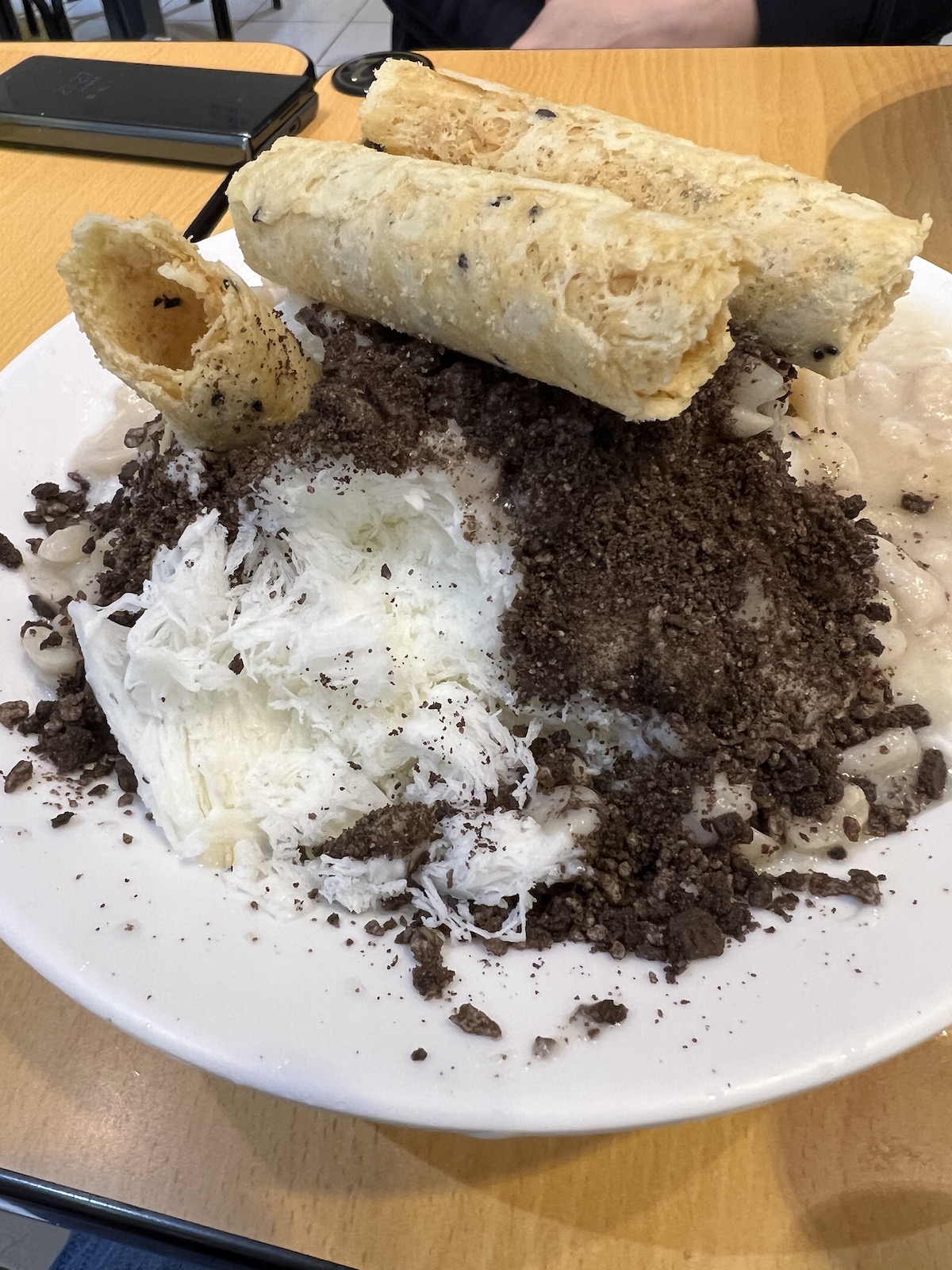 Taiwanese Shaved Ice. Get it with Condensed mile. And those egg roll cookies on top? Amazing.